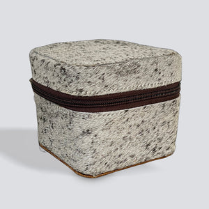 Speckled greige container with a dark chocolate brown speckled zipper on a light gray background