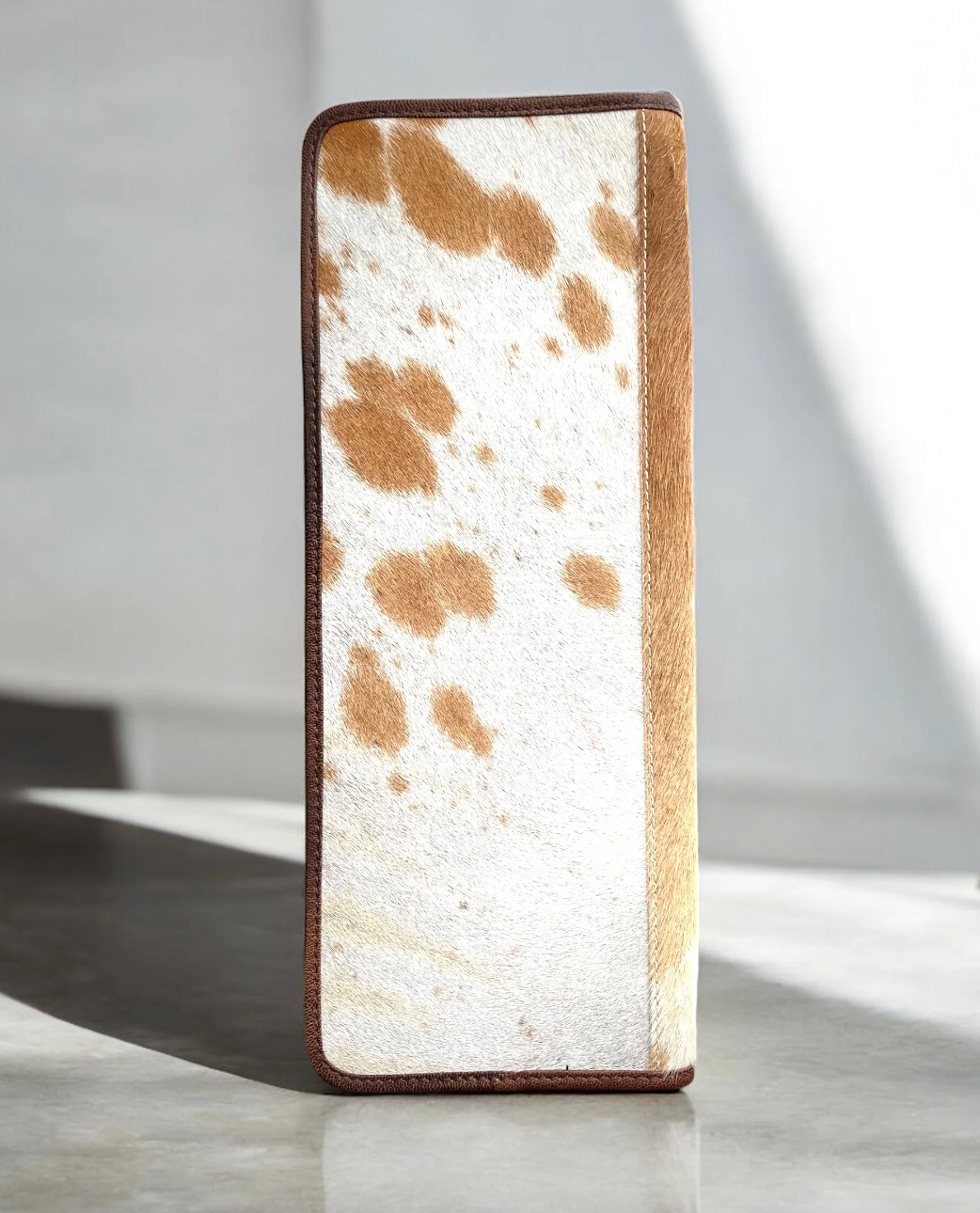 LEATHER AND COWHIDE JEWELRY WALLET